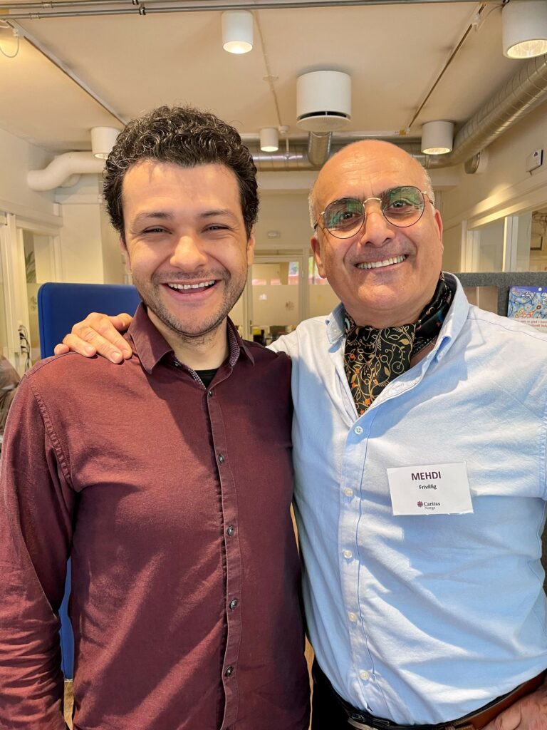 Luis og Mehdi er begge frivillige i Caritas Norge